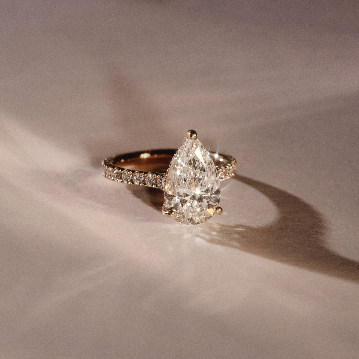 Amora Pear 2.55ct Hidden Halo Lab Diamond Engagement Ring With Side Stones Set in 18K Gold