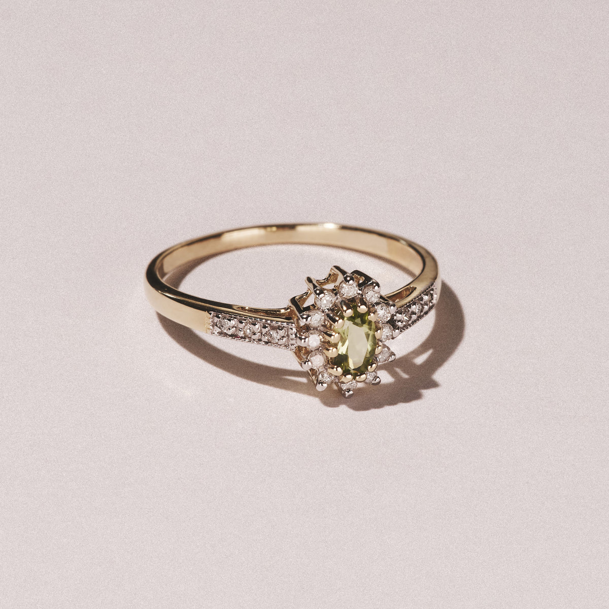 Peridot 5 x 3mm And Diamond 9K Yellow Gold Ring A4213