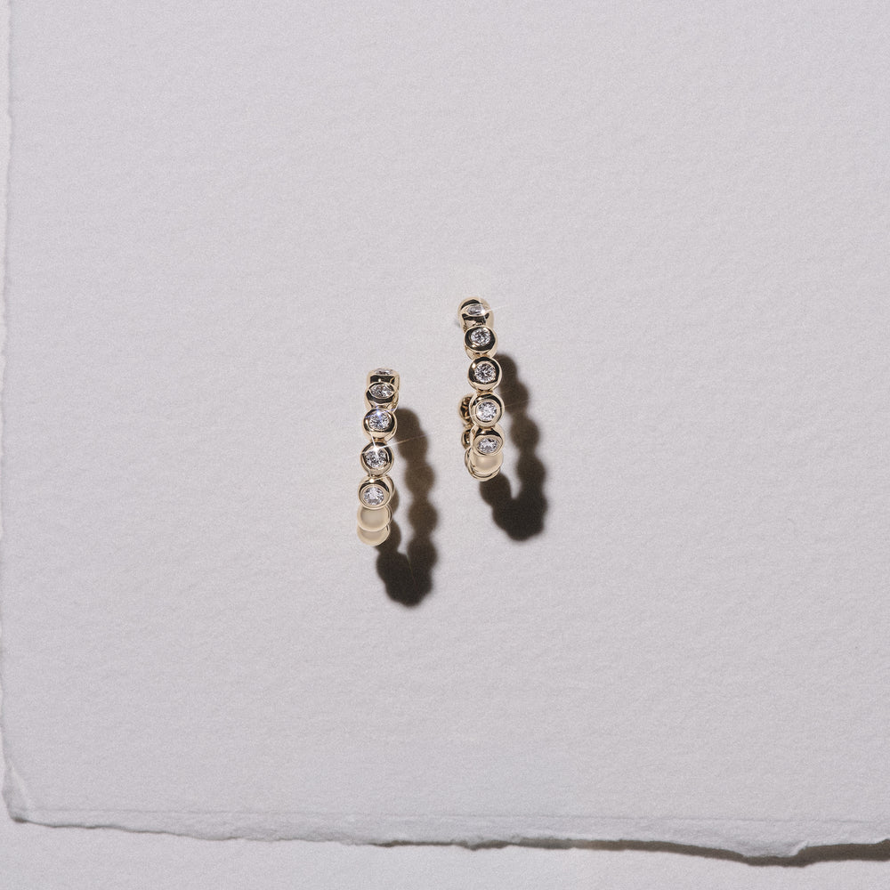 Solis 0.25ct Round Cut Lab Diamond Huggie Earrings in 18K Gold Vermeil