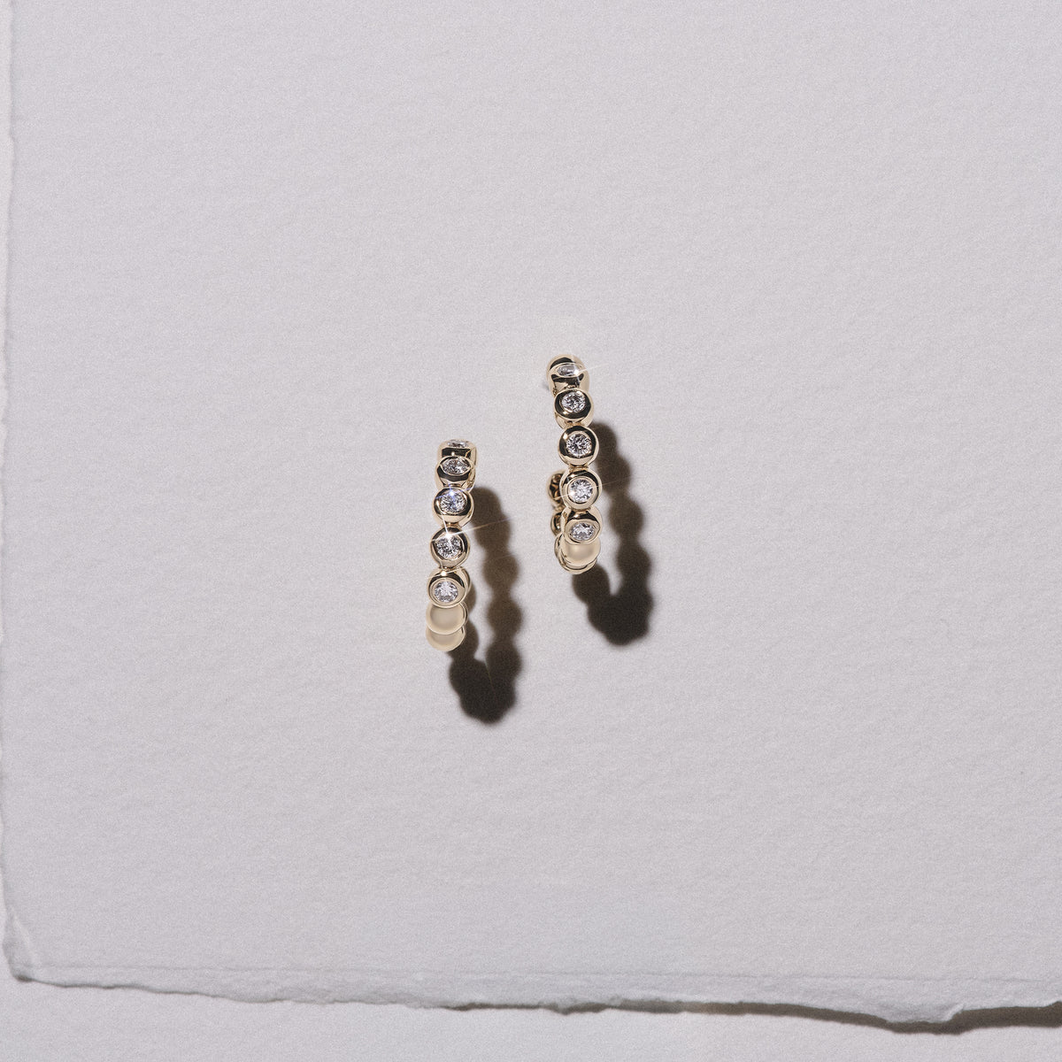 Solis 0.25ct Round Cut Lab Diamond Huggie Earrings in 18K Gold Vermeil
