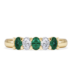 Solene 0.75ct Oval Cut Lab Emerald and Lab Diamond Half Band Eternity Ring in 18K Yellow Gold