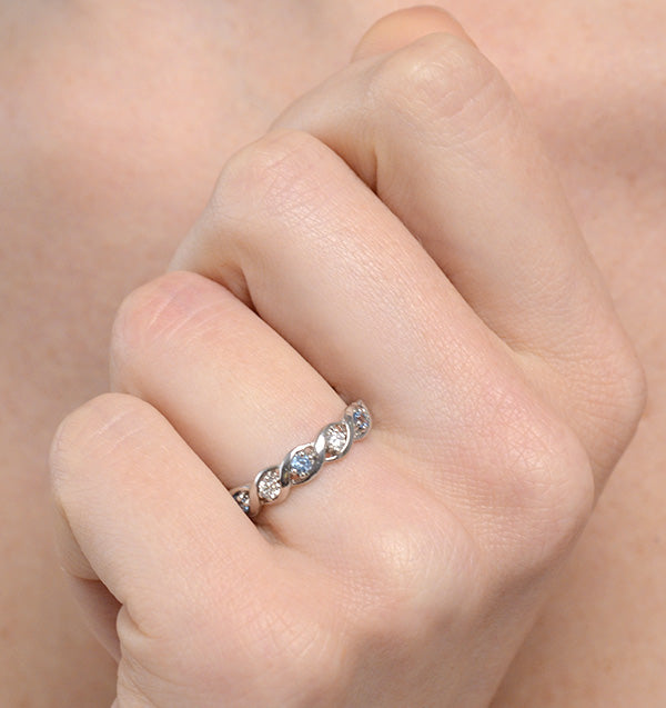 Blue Topaz 0.18CT And Diamond 9K White Gold Ring