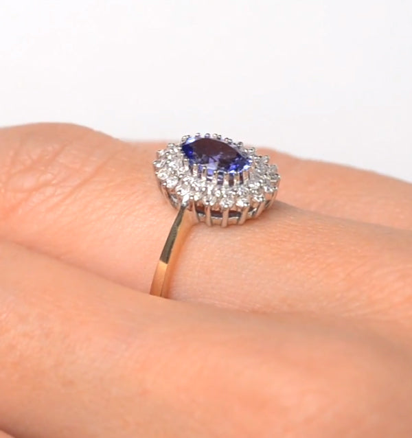 Tanzanite 7 x 5mm And Diamond 9K Gold Ring