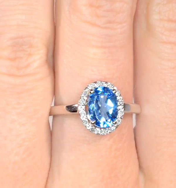 Blue Topaz 1.56CT And Diamond 9K White Gold Ring