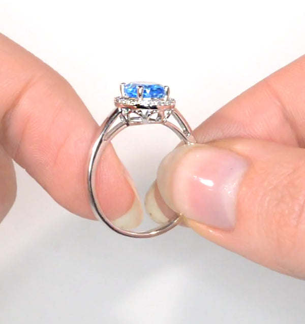 Blue Topaz 1.56CT And Diamond 9K White Gold Ring