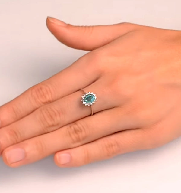Emerald 0.83ct And Diamond 9K White Gold Ring