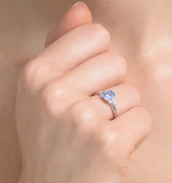 Blue Topaz 0.94CT And Diamond 9K White Gold Ring