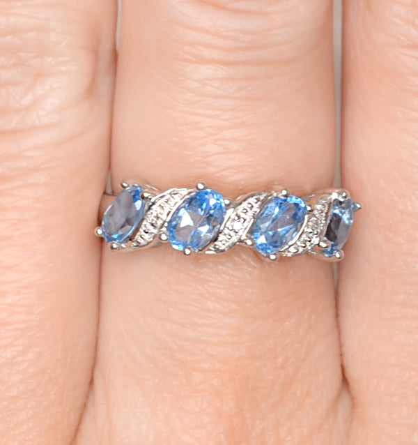 Blue Topaz 0.98CT And Diamond 9K White Gold Ring