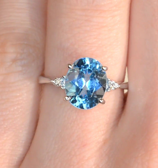 9K White Gold Diamond and 2.60ct Blue Topaz Ring