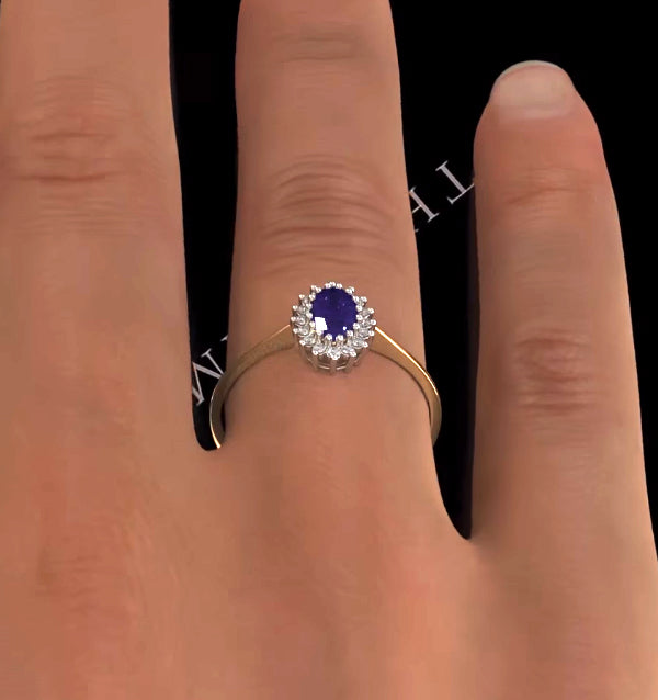 Tanzanite 6 x 4mm And Diamond 18K Gold Ring