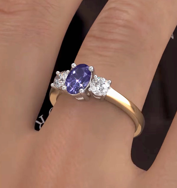 Tanzanite 7 x 5mm And Diamond 18K Gold Ring FET23-V