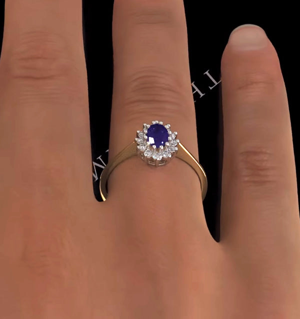 Tanzanite 6 x 4mm And Diamond 18K Gold Ring FET33-V
