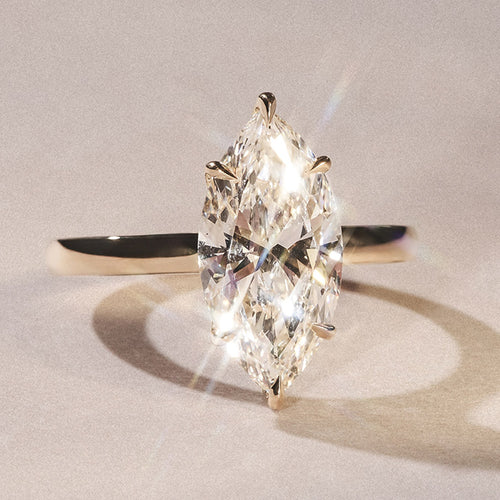 gold engagement carousel 18k