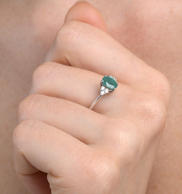 Emerald 0.75ct And Diamond 18K White Gold Ring