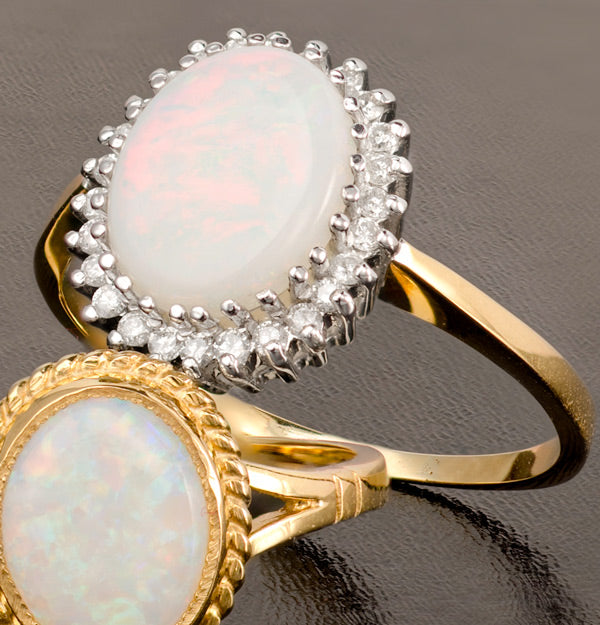 Opal 10 x 8mm And Diamond 9K Yellow Gold Ring