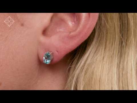 Blue Topaz 7 x 5mm and 9K White Gold Earrings