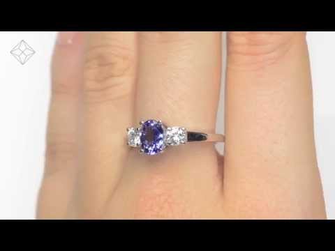 Tanzanite 7 x 5mm And Diamond 18K White Gold Ring