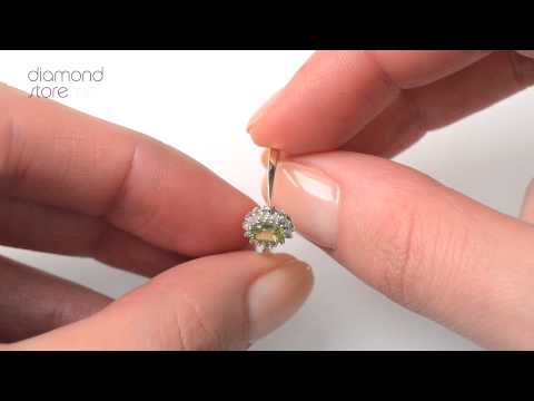 Peridot 5 x 3mm And Diamond 9K Yellow Gold Ring