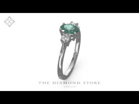 Emerald 0.75ct And Diamond 18K White Gold Ring