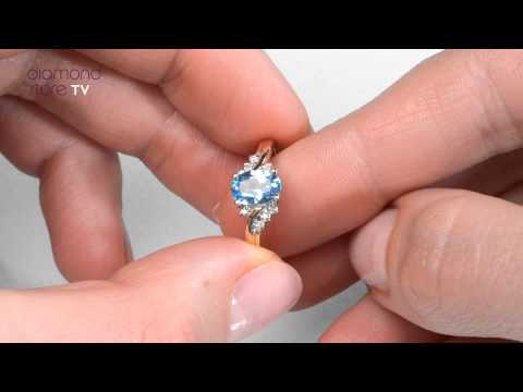 Blue Topaz 0.94CT And Diamond 9K Yellow Gold Ring