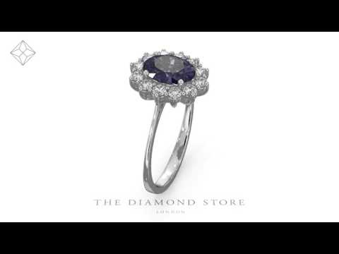 Tanzanite 8 x 6mm And 0.50ct Diamond 18K White Gold Ring