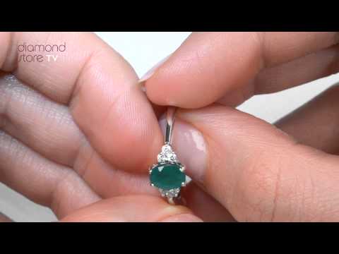 Emerald 0.75ct And Diamond 18K White Gold Ring