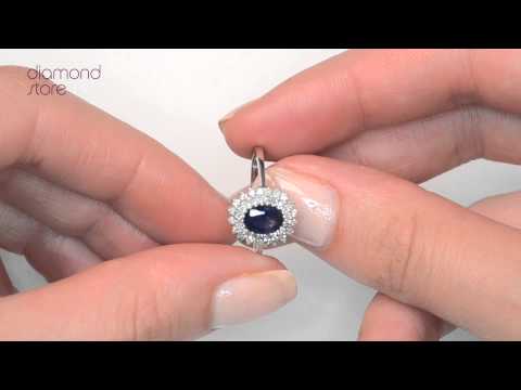 Sapphire 7 x 5mm And Diamond 9K White Gold Ring