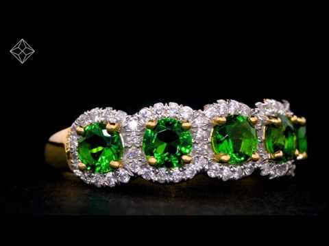 Emerald and Diamond Halo 5 Stone Asteria Ring in 18K Gold