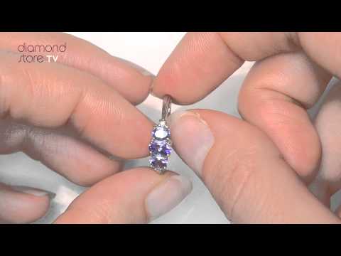 Tanzanite 0.59CT And Diamond 9K White Gold Ring